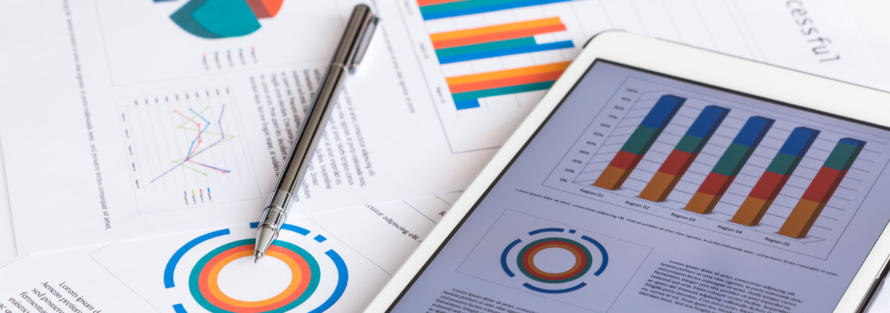 stock photo financial charts on the table with tablet and pen 175980752b